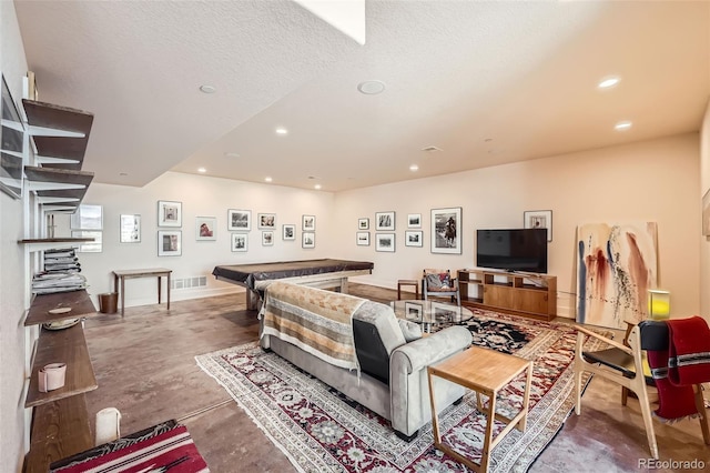 8611 Coachlight Way, Littleton, CO 80125 - living room with finished concrete floors and recessed lighting