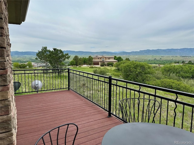 8611 Coachlight Way, Littleton, CO 80125 - wooden deck with a mountain view
