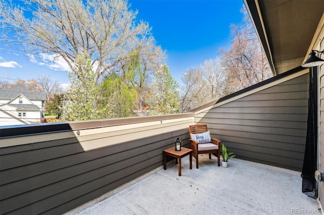 view of patio with a balcony