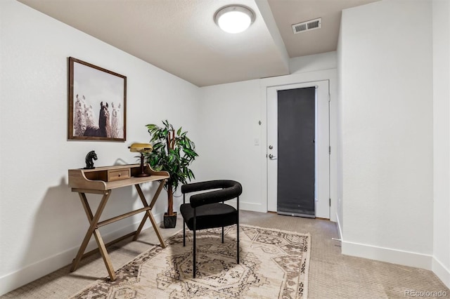 office space featuring carpet flooring and baseboards