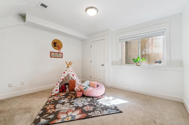 playroom with carpet floors and baseboards