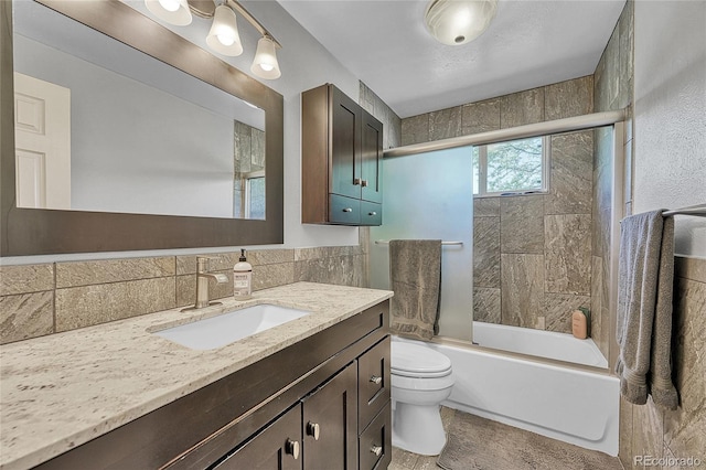 8032 Lee Ct, Arvada, CO 80005 - full bathroom featuring vanity and bath / shower combo with glass door