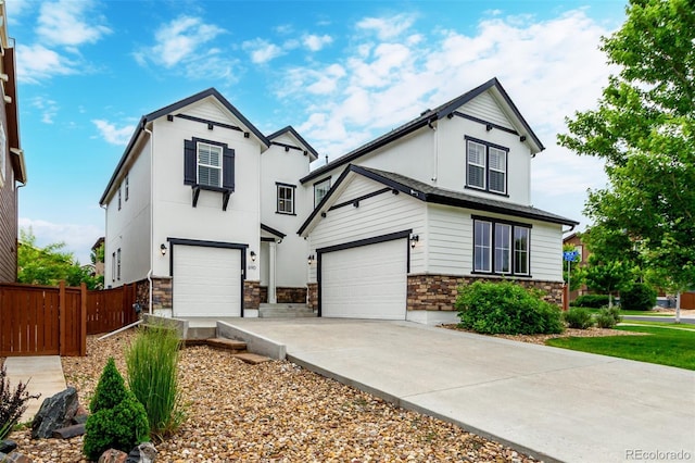690 W 172nd Pl, Broomfield, CO 80023 - traditional home featuring stone siding, concrete driveway, a garage, and stucco siding