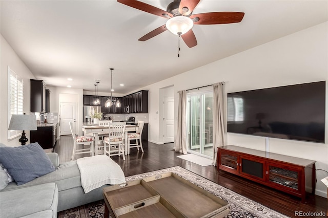 690 W 172nd Pl, Broomfield, CO 80023 - living area with dark wood-style flooring, healthy amount of natural light, a ceiling fan, and recessed lighting