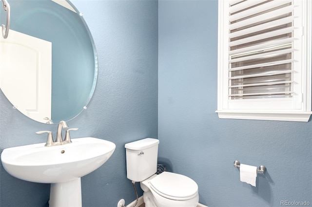 690 W 172nd Pl, Broomfield, CO 80023 - half bath with toilet and radiator