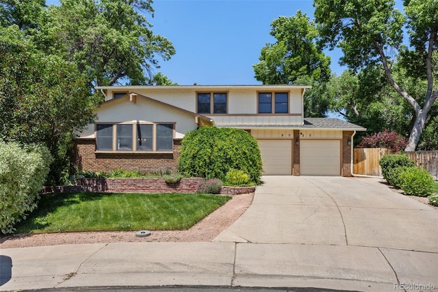 9025 Jellison Ct, Broomfield, CO 80021 - view of front of property featuring brick siding, driveway, a garage, and stucco siding
