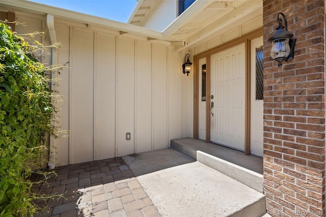 9025 Jellison Ct, Broomfield, CO 80021 - entrance to property featuring board and batten siding and brick siding