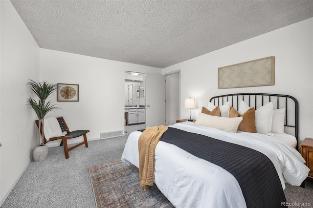 9025 Jellison Ct, Broomfield, CO 80021 - bedroom featuring carpet flooring, a textured ceiling, and ensuite bath