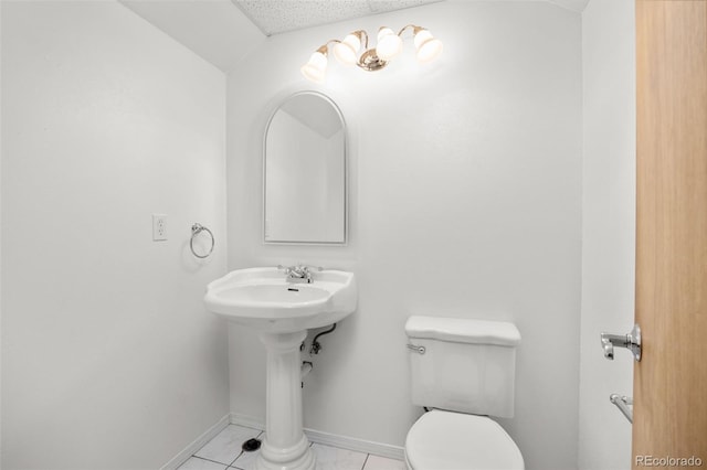 9025 Jellison Ct, Broomfield, CO 80021 - half bathroom featuring toilet and tile patterned flooring