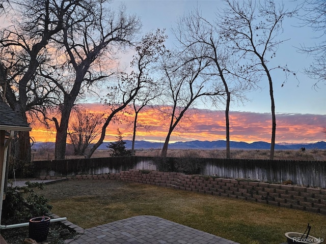 9025 Jellison Ct, Broomfield, CO 80021 - fenced backyard with a water view and a patio area