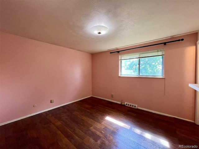 7245 S Dexter St, Centennial, CO 80122 - empty room with wood finished floors and baseboards
