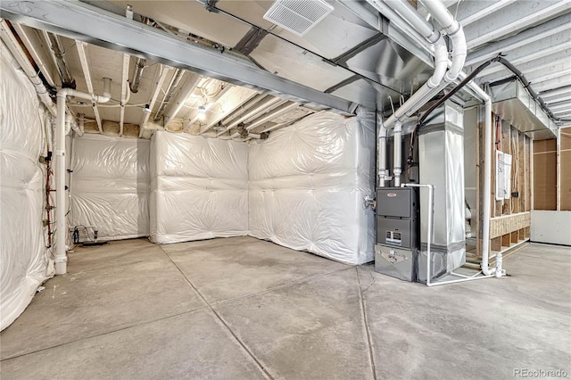 basement featuring heating unit