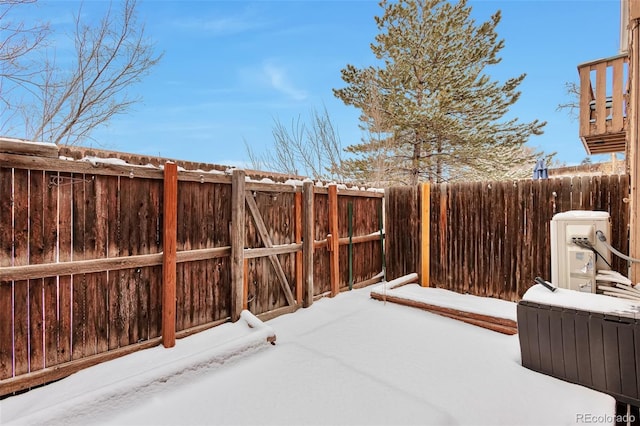 snowy yard with ac unit