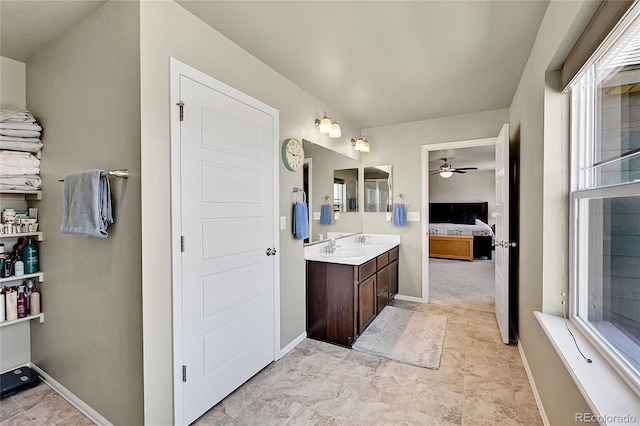 7888 E 139th Pl, Brighton, CO 80602 - full bath with ensuite bath, vanity, and a ceiling fan
