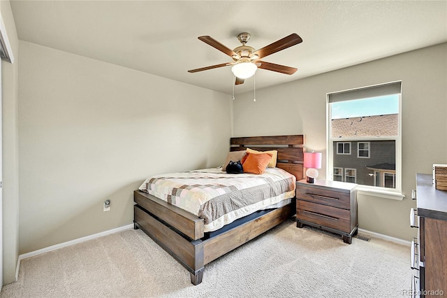 7888 E 139th Pl, Brighton, CO 80602 - bedroom featuring light colored carpet and ceiling fan