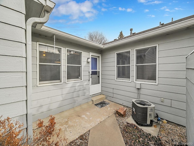 doorway to property with central AC