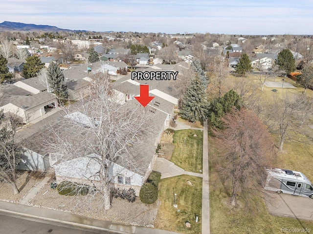 aerial view with a mountain view and a residential view