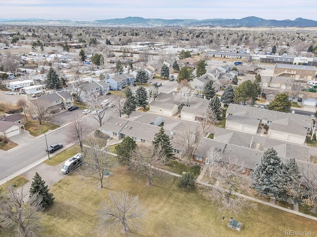 drone / aerial view with a residential view and a mountain view