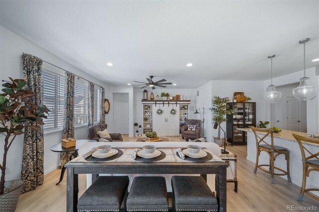dining room with recessed lighting, light wood-style flooring, and ceiling fan