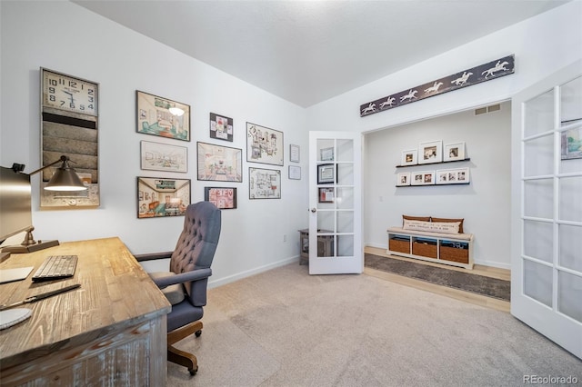 office featuring carpet flooring, baseboards, french doors, and visible vents