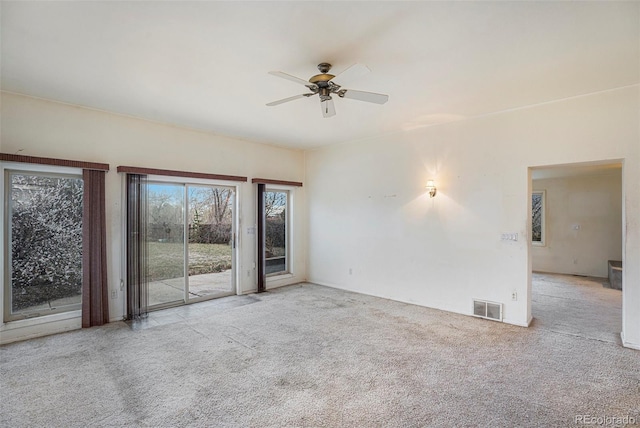 968 Terrace Cir, Colorado Springs, CO 80904 - spare room with a ceiling fan, carpet floors, and visible vents