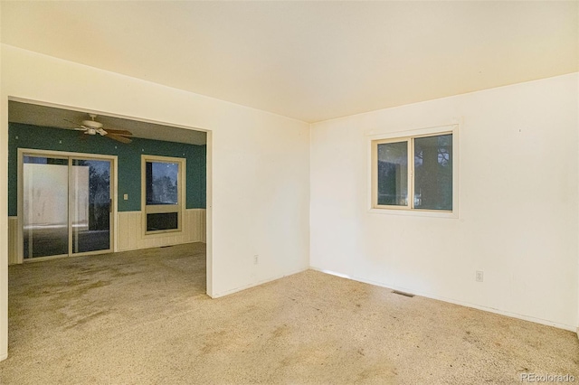 968 Terrace Cir, Colorado Springs, CO 80904 - empty room with a ceiling fan, visible vents, and carpet