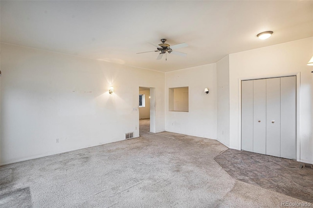 968 Terrace Cir, Colorado Springs, CO 80904 - unfurnished bedroom with visible vents, a closet, carpet, and a ceiling fan