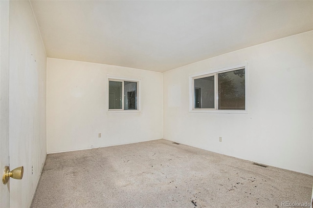 968 Terrace Cir, Colorado Springs, CO 80904 - empty room featuring carpet floors and visible vents