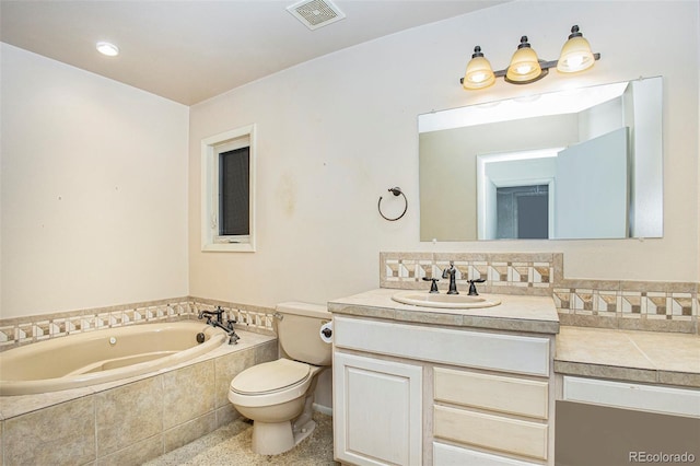 968 Terrace Cir, Colorado Springs, CO 80904 - full bathroom with toilet, vanity, a garden tub, and visible vents