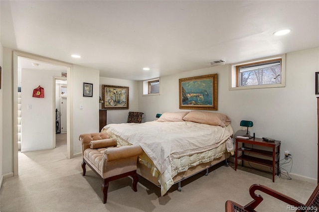 bedroom with recessed lighting, light colored carpet, visible vents, and baseboards