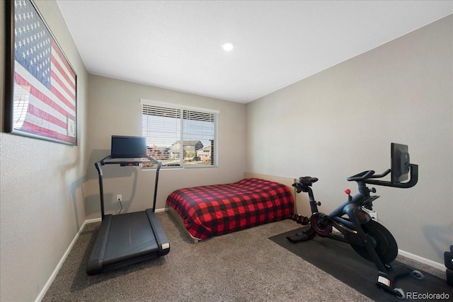 bedroom featuring carpet floors and baseboards
