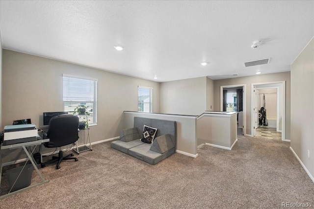 carpeted office with visible vents, recessed lighting, and baseboards