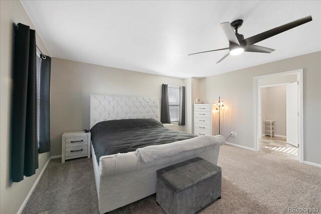 bedroom featuring baseboards, a ceiling fan, and light colored carpet