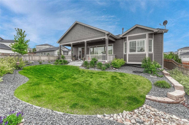 2932 Eagle Wing Way, Castle Rock, CO 80109 - rear view of house featuring covered porch