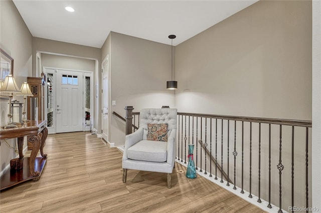 2932 Eagle Wing Way, Castle Rock, CO 80109 - entrance foyer with wood finished floors, baseboards, and recessed lighting