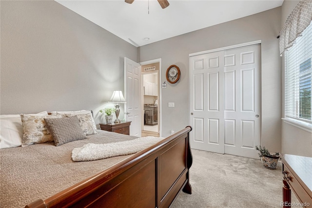 2932 Eagle Wing Way, Castle Rock, CO 80109 - bedroom with light colored carpet, a closet, and a ceiling fan