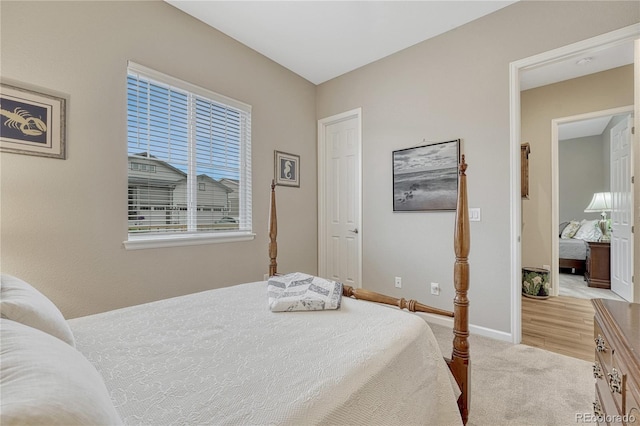 2932 Eagle Wing Way, Castle Rock, CO 80109 - bedroom featuring light carpet and baseboards