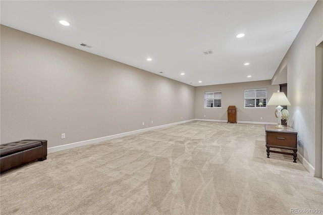 2932 Eagle Wing Way, Castle Rock, CO 80109 - unfurnished living room featuring light carpet, recessed lighting, and baseboards