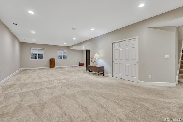 2932 Eagle Wing Way, Castle Rock, CO 80109 - basement with light carpet, stairs, baseboards, and recessed lighting