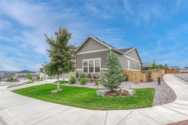 2932 Eagle Wing Way, Castle Rock, CO 80109 - view of property exterior featuring stone siding and concrete driveway