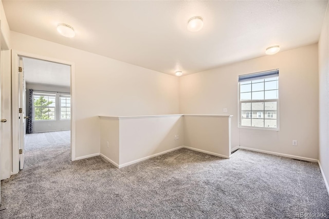 12704 Jasmine St Unit E, Thornton, CO 80602 - empty room featuring carpet
