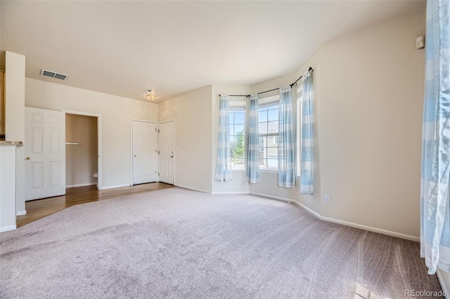 12704 Jasmine St Unit E, Thornton, CO 80602 - unfurnished bedroom featuring carpet and baseboards