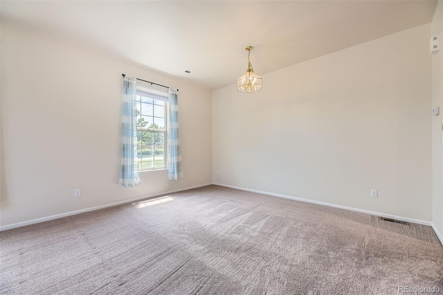 12704 Jasmine St Unit E, Thornton, CO 80602 - carpeted spare room featuring baseboards