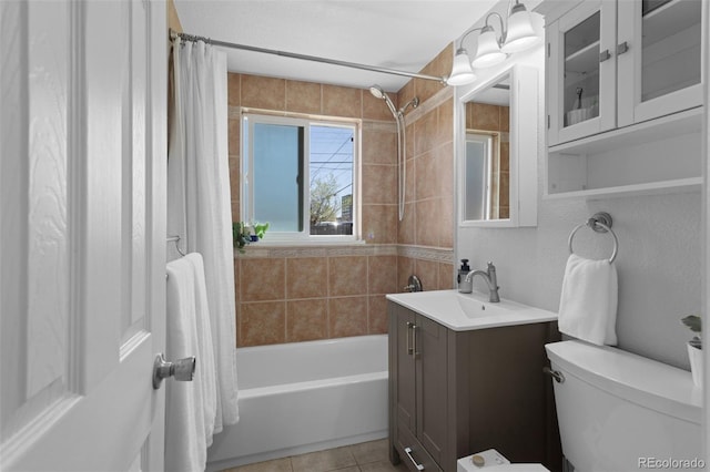 3300 Oneida St, Denver, CO 80207 - bathroom with vanity, tile patterned floors, toilet, and shower / tub combo with curtain