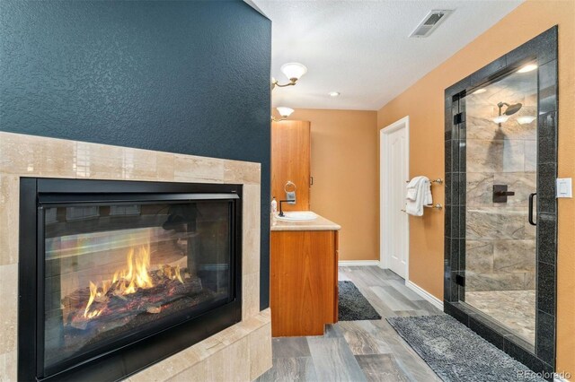 7 Sandpiper Cir, Thornton, CO 80241 - detailed view of wood finished floors and a fireplace