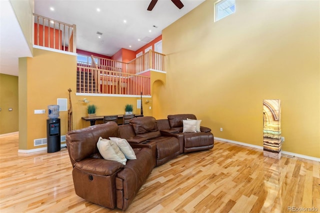 7 Sandpiper Cir, Thornton, CO 80241 - living room featuring a high ceiling, wood finished floors, a ceiling fan, and recessed lighting