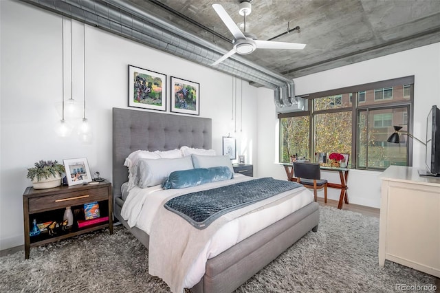 bedroom featuring dark hardwood / wood-style floors and ceiling fan