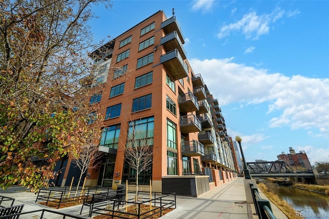 view of property with a water view