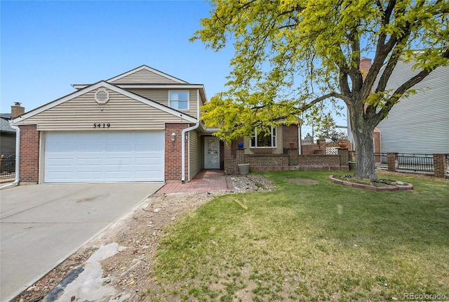 5419 E 113th Ave, Thornton, CO 80233 - view of front facade with driveway, brick siding, and an attached garage