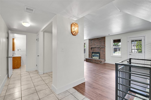 5419 E 113th Ave, Thornton, CO 80233 - hall featuring baseboards and light tile patterned flooring